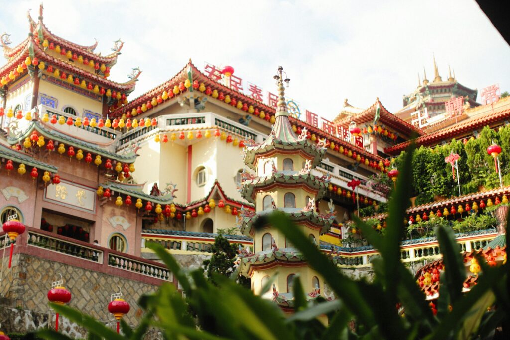 Colorful Kek Lok Si Temple in Penang, adorned with lanterns and traditional architectural elements.